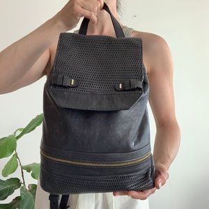 SHE+LO black genuine leather purse. Back pack bag.